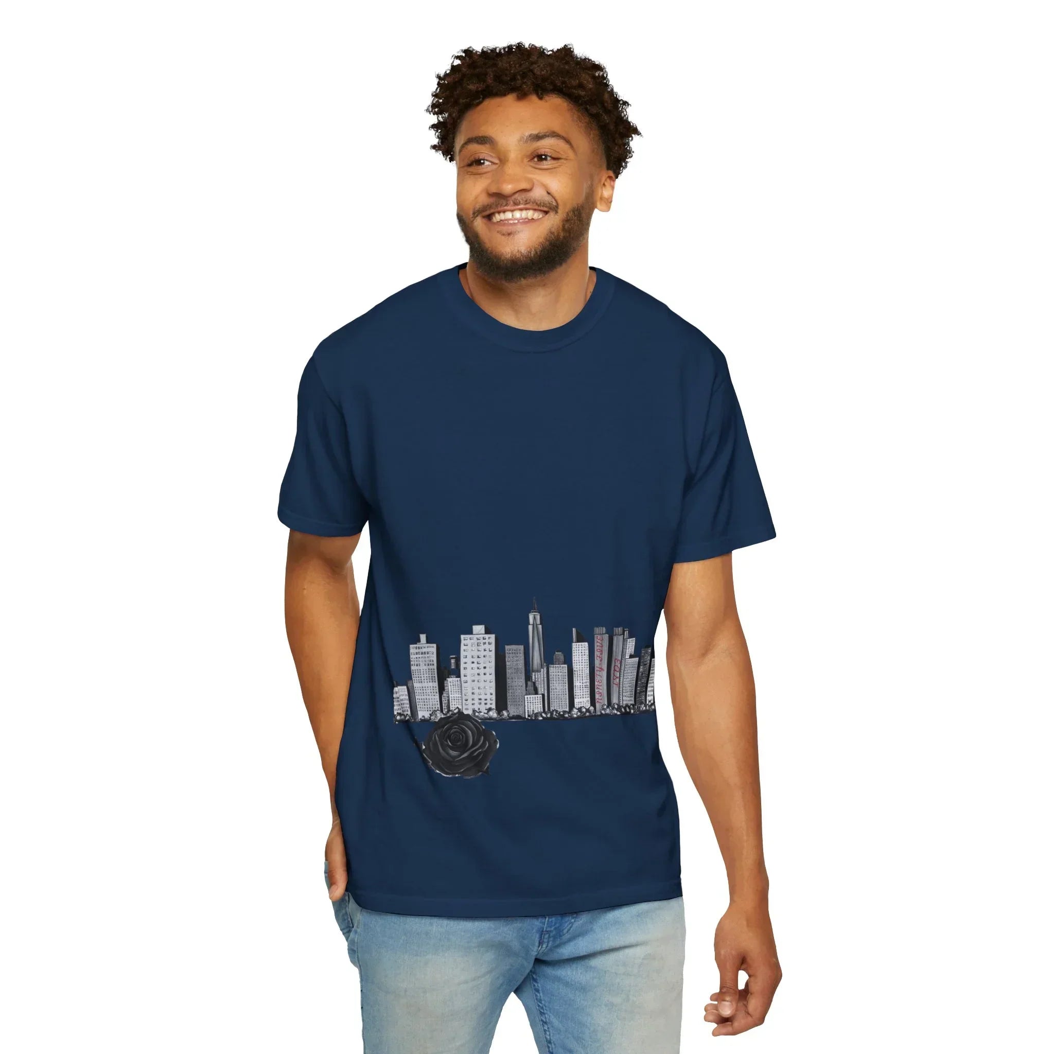 Man wearing navy tee with city skyline and black rose graphic, East Coast urban style