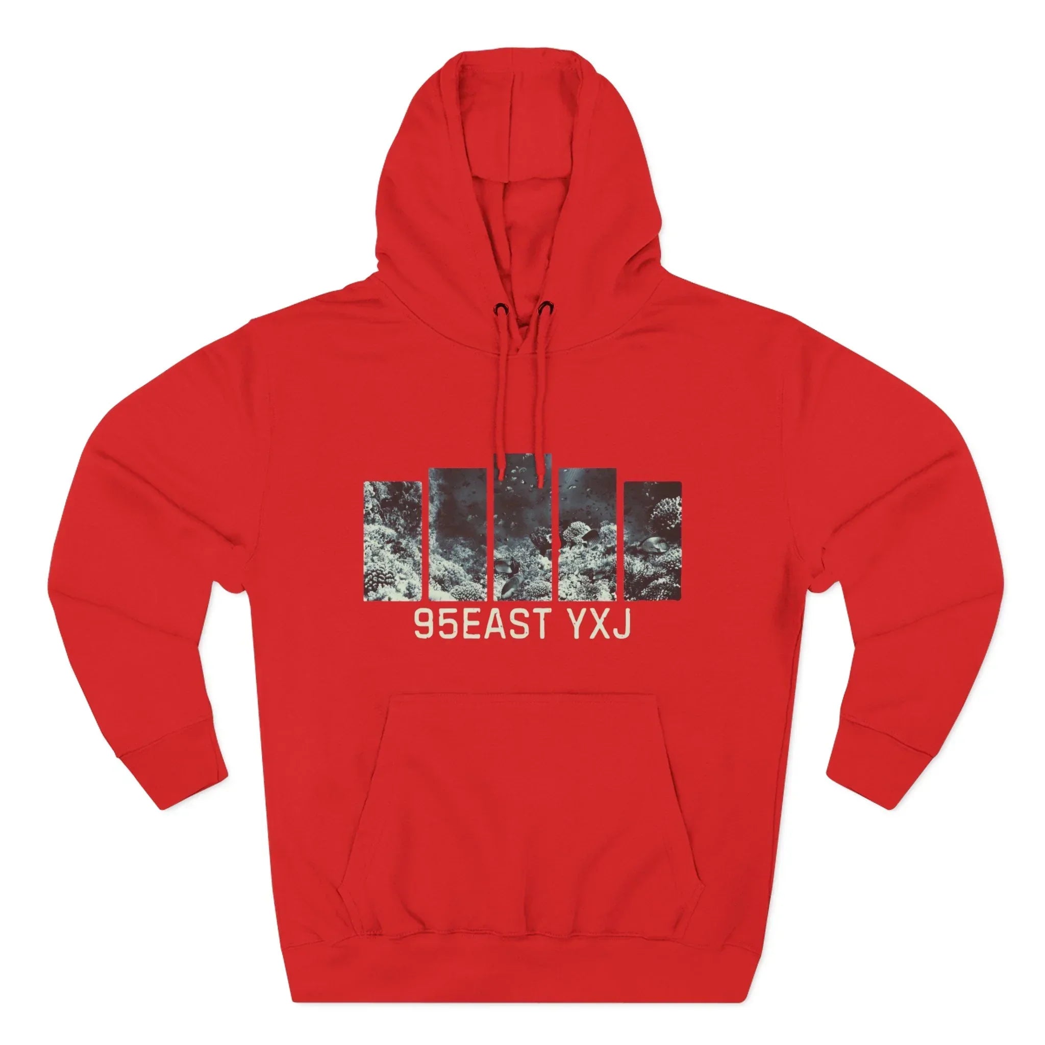 Red hoodie with abstract black and white graphic and 95EAST YXJ text on front