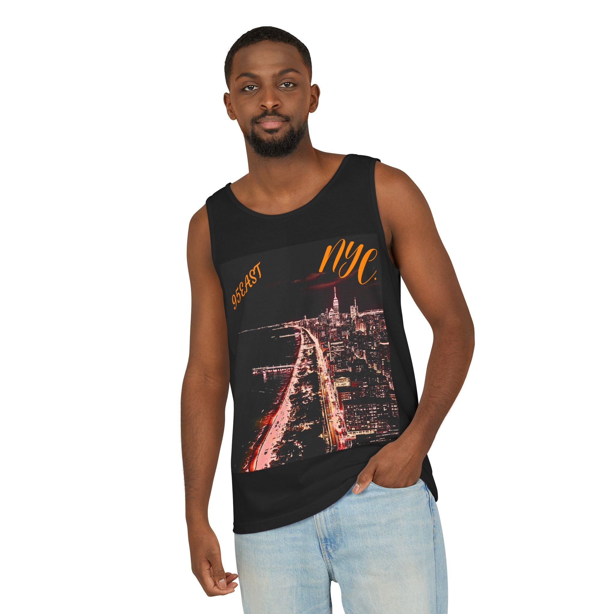 Man in black NYC graphic tank top with cityscape, wearing light blue jeans, white background