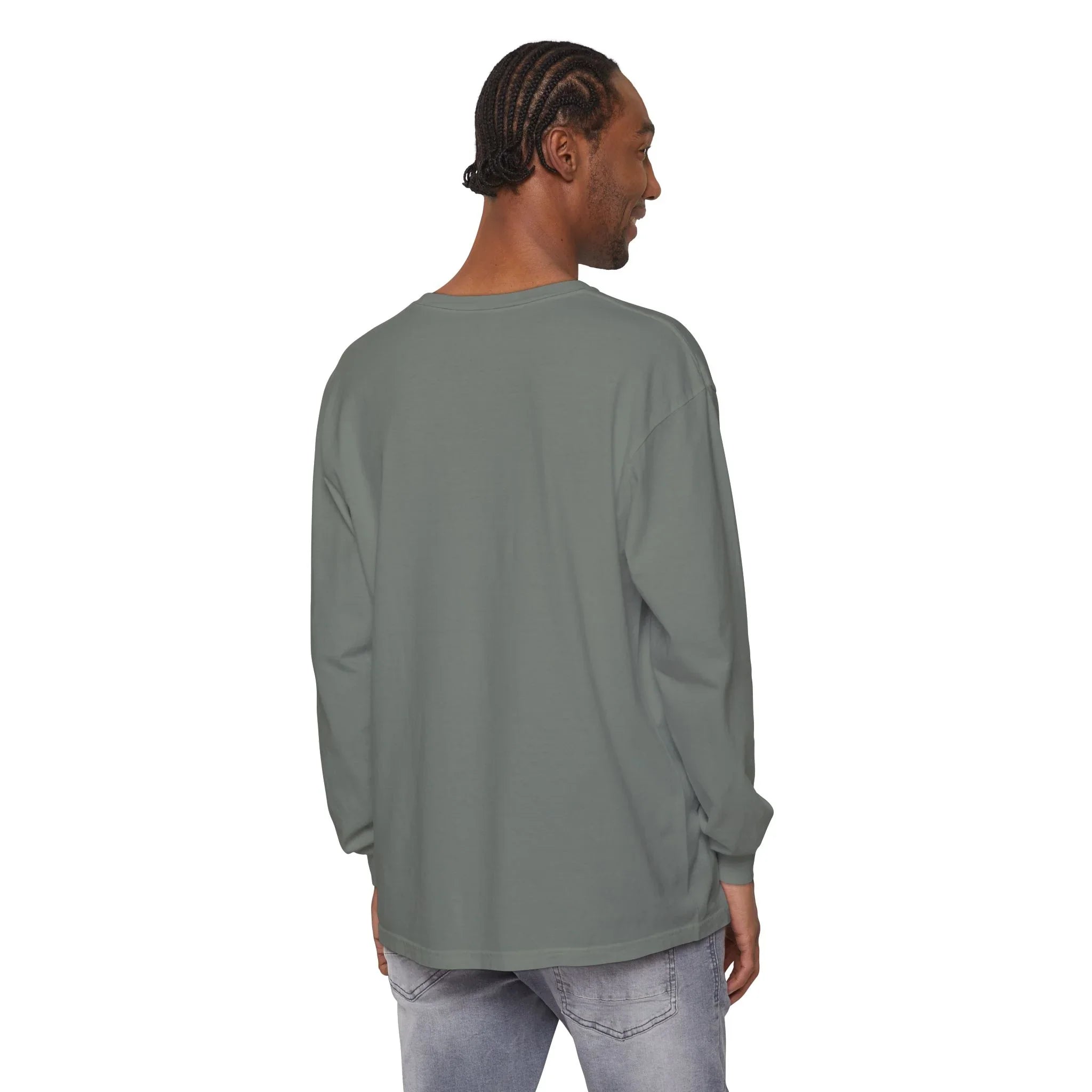 Man wearing olive green long sleeve tee with relaxed fit, styled with light wash jeans for casual everyday wear.