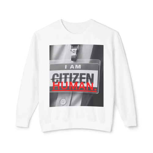 White sweatshirt with bold graphic print featuring a badge reading 'I AM HUMAN.'