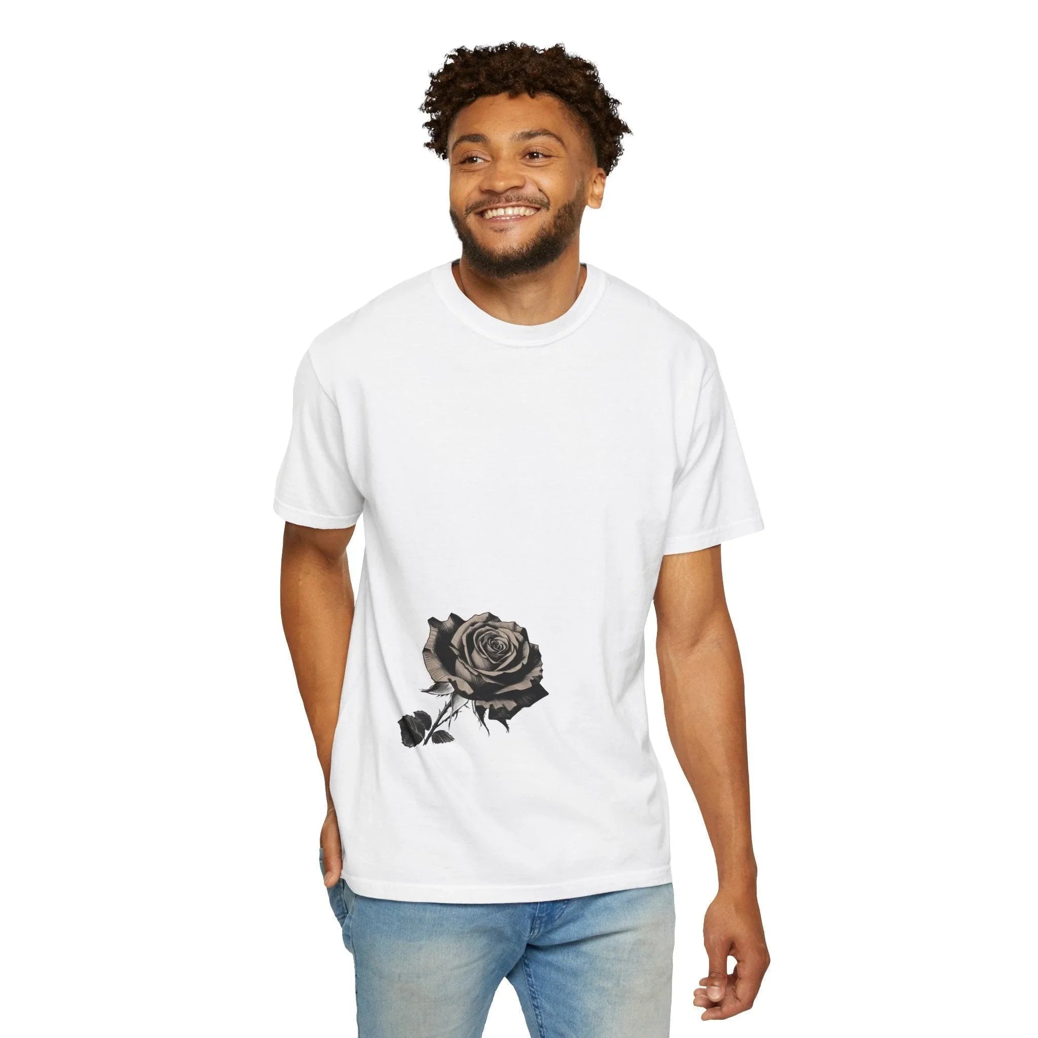 Man wearing white t-shirt with black rose graphic, casual style