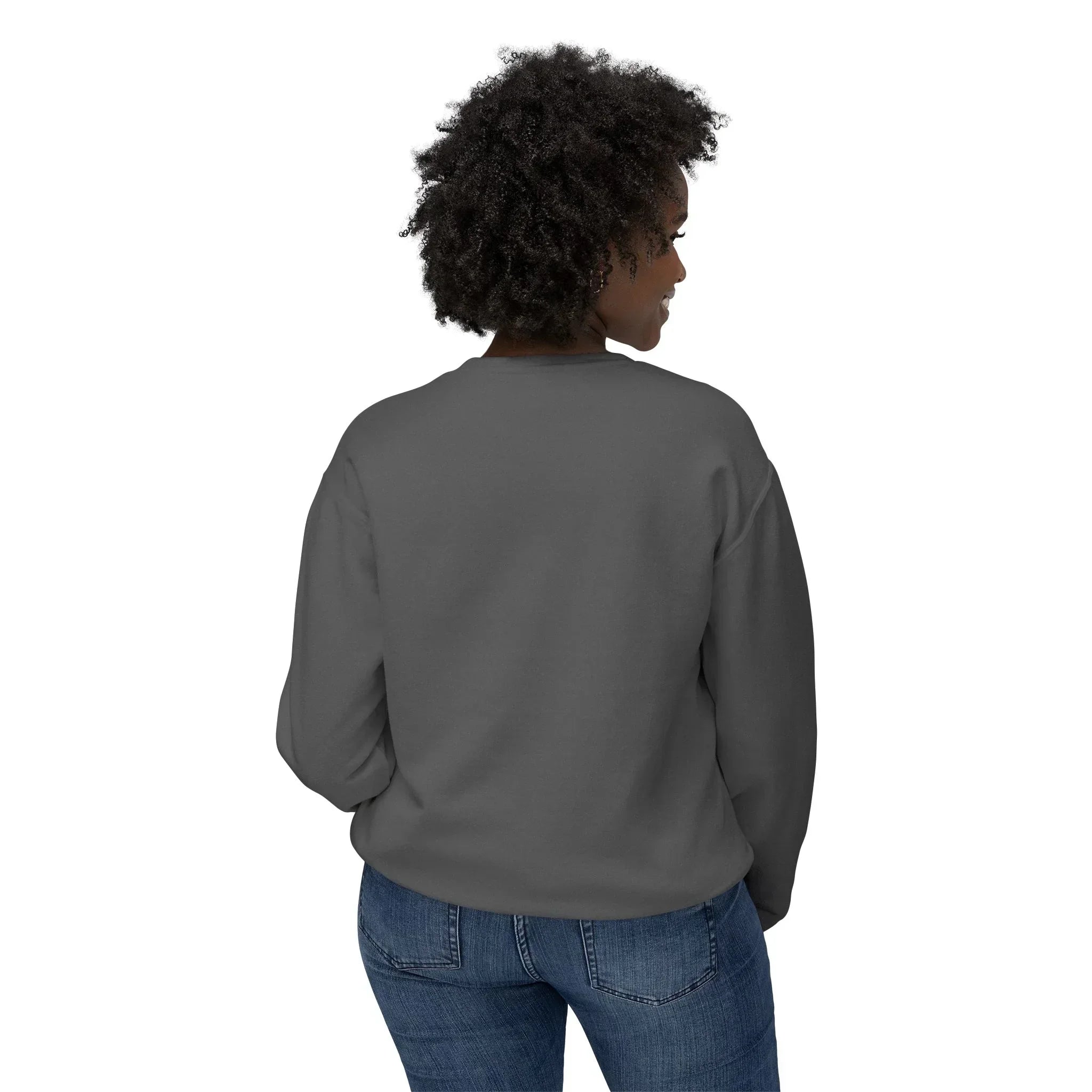 Woman in dark grey crewneck sweatshirt and blue jeans, shown from the back on white background