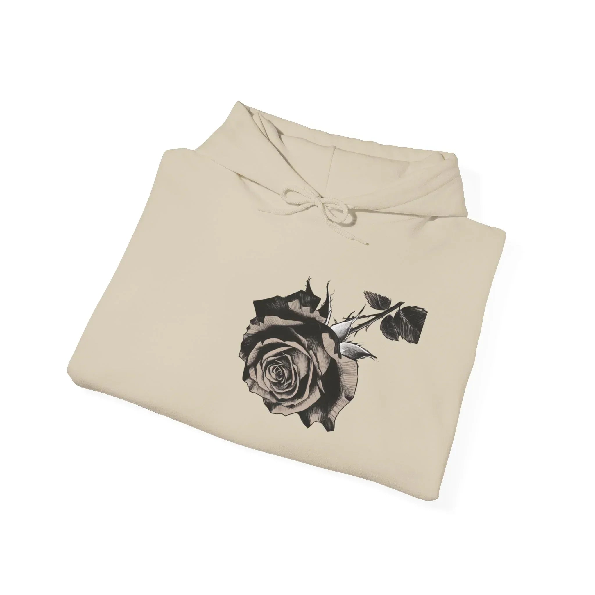 Beige hoodie with black rose graphic on front, folded on white background