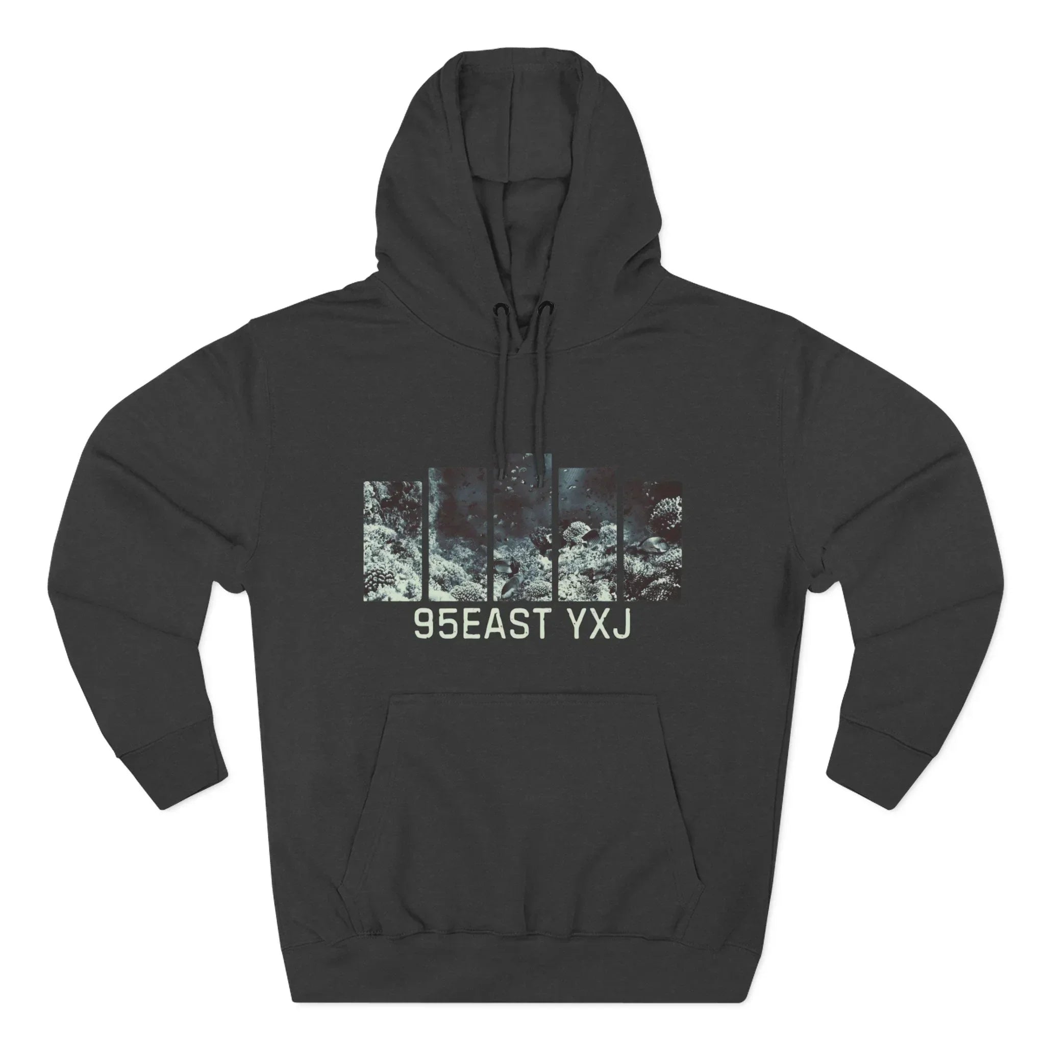 Black hoodie with abstract forest panel graphic and 95EAST YXJ text on front