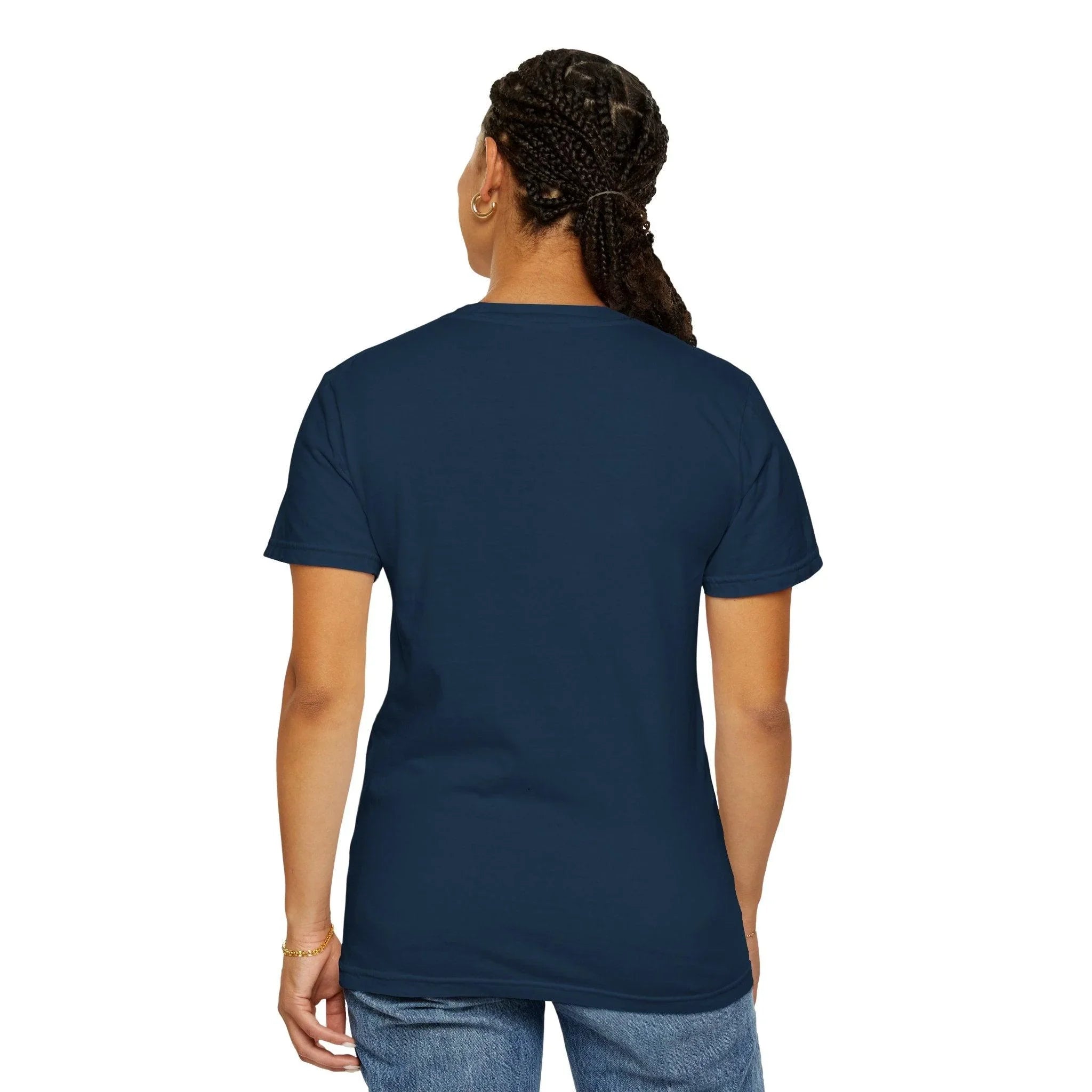 Navy blue t-shirt worn by woman with braided hair, showcasing minimalist design and casual style.
