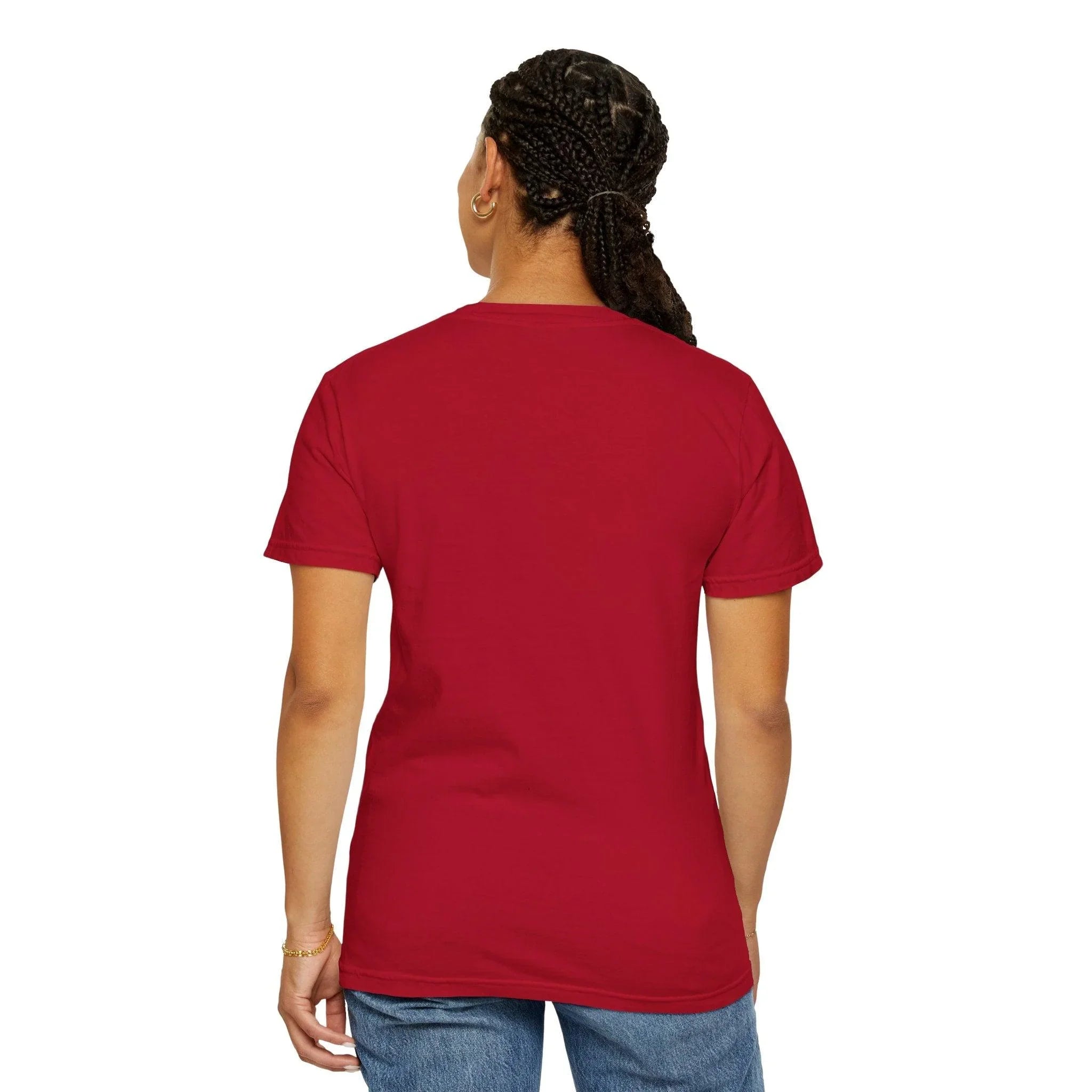 Woman wearing red t-shirt with braided hair, showcasing casual style and comfort.