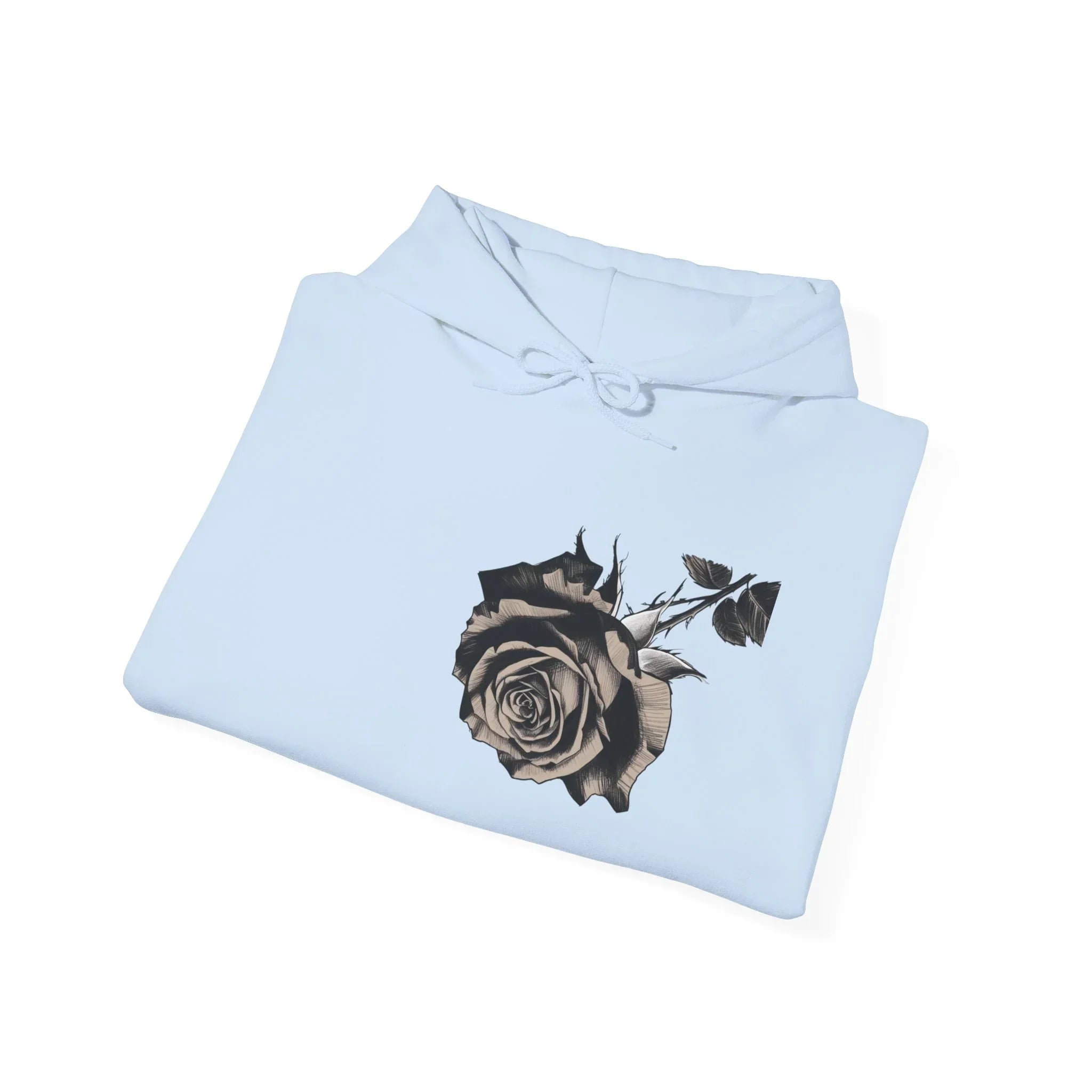 Light blue hoodie with black rose graphic folded on white background