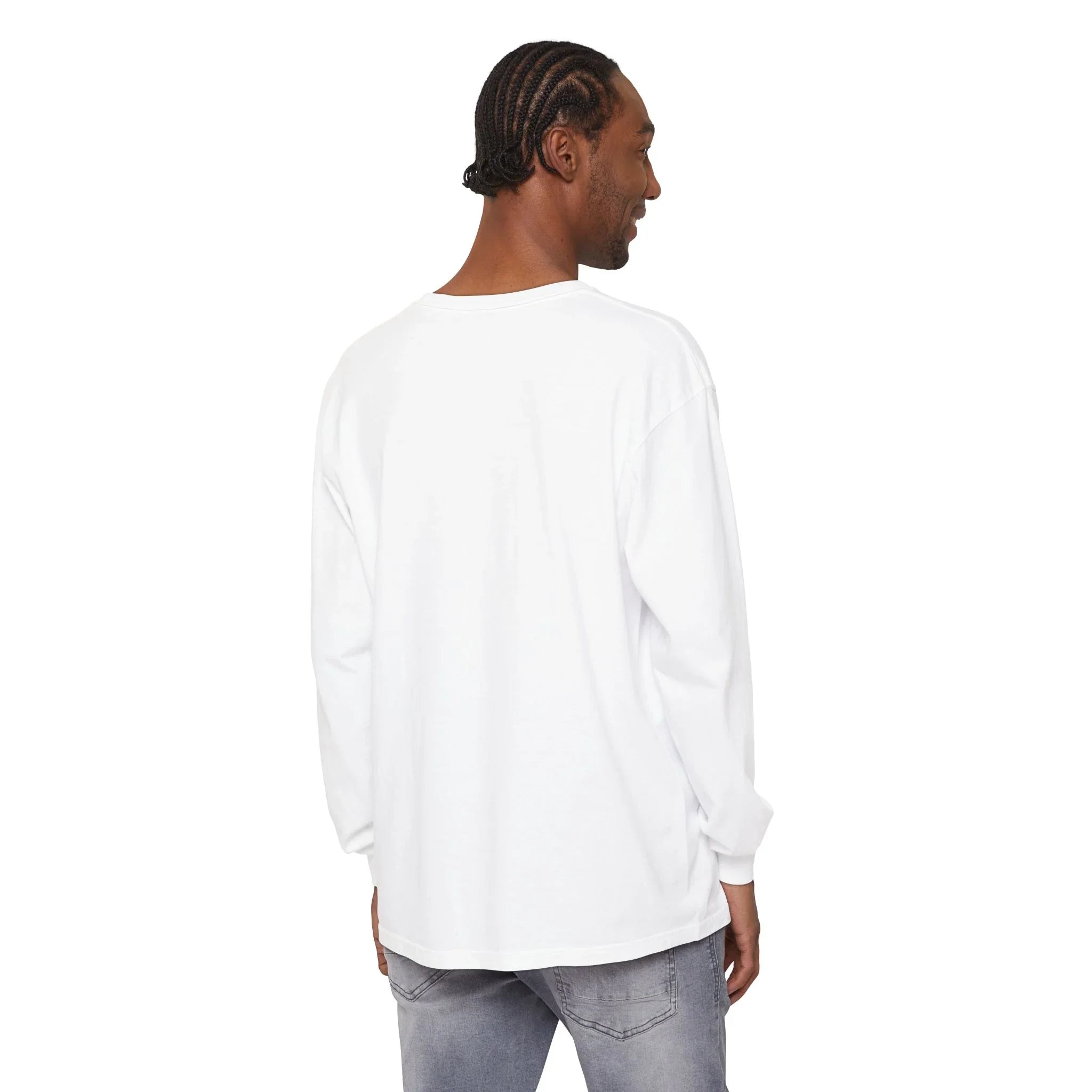 Man wearing white long-sleeve shirt and gray jeans, showcasing casual East Coast style