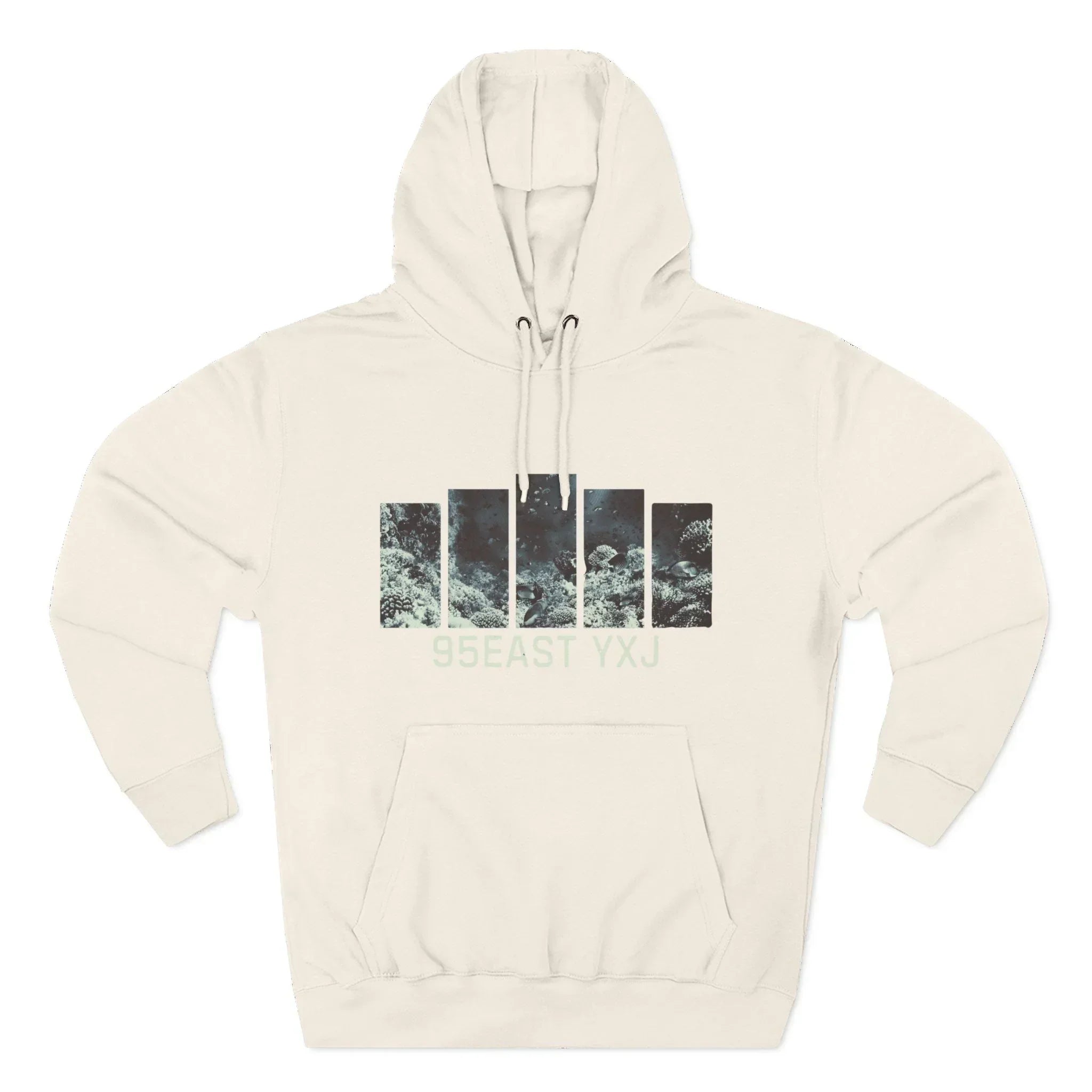 Cream hoodie with ocean-inspired graphic bars and 95EAST YXJ text on front