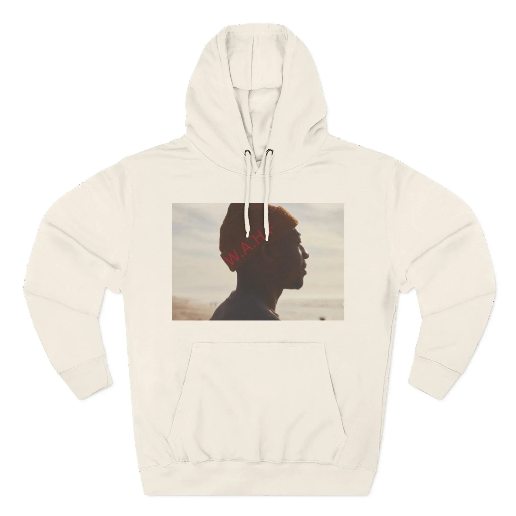 Beige hoodie with silhouette photo of man in beanie and letters W.A.H. on chest