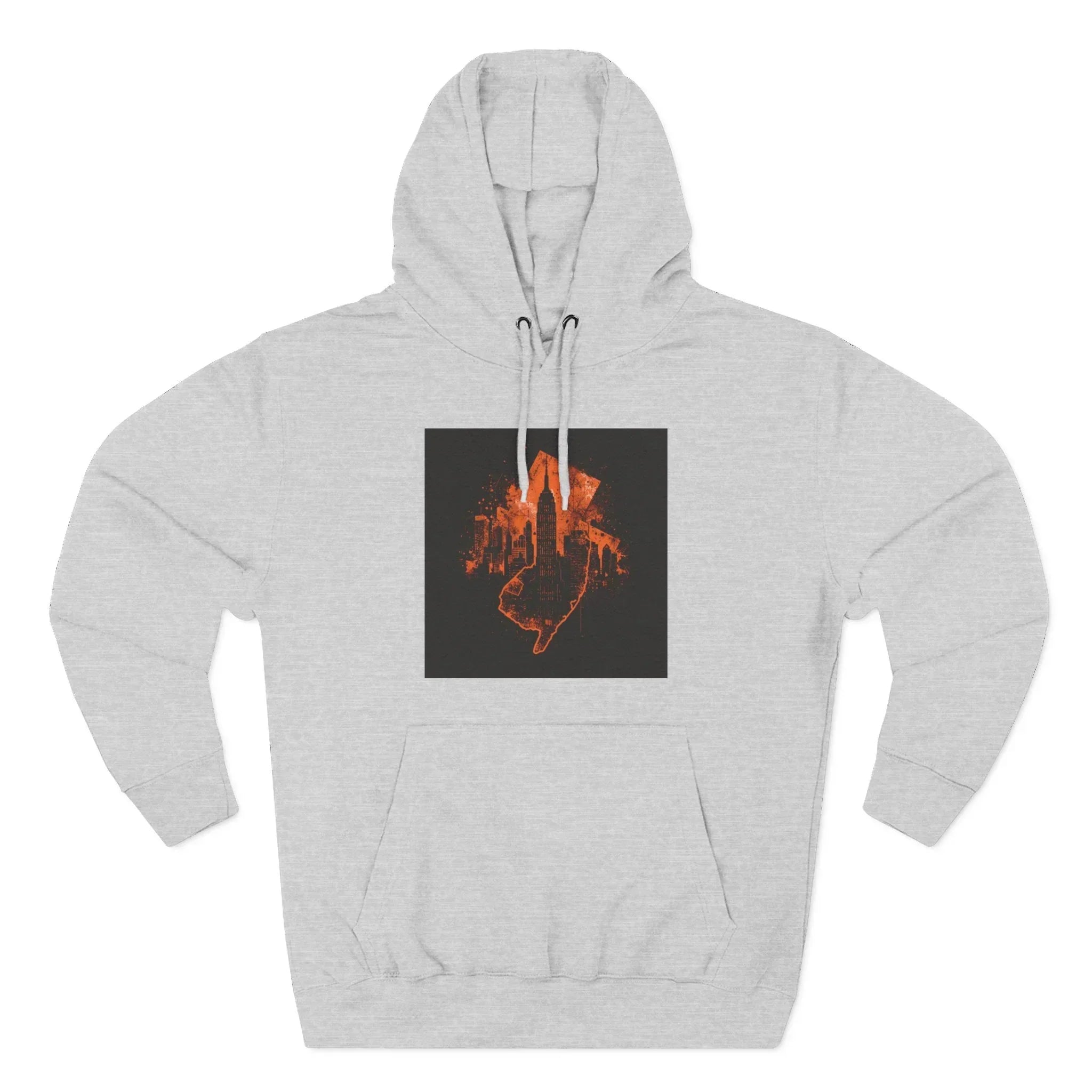 Light gray hoodie with orange cityscape and hand graphic on black square chest patch