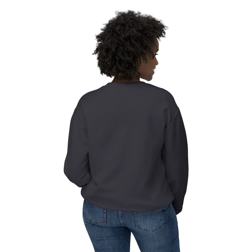 Woman in dark crewneck sweatshirt and blue jeans, back view, on white background