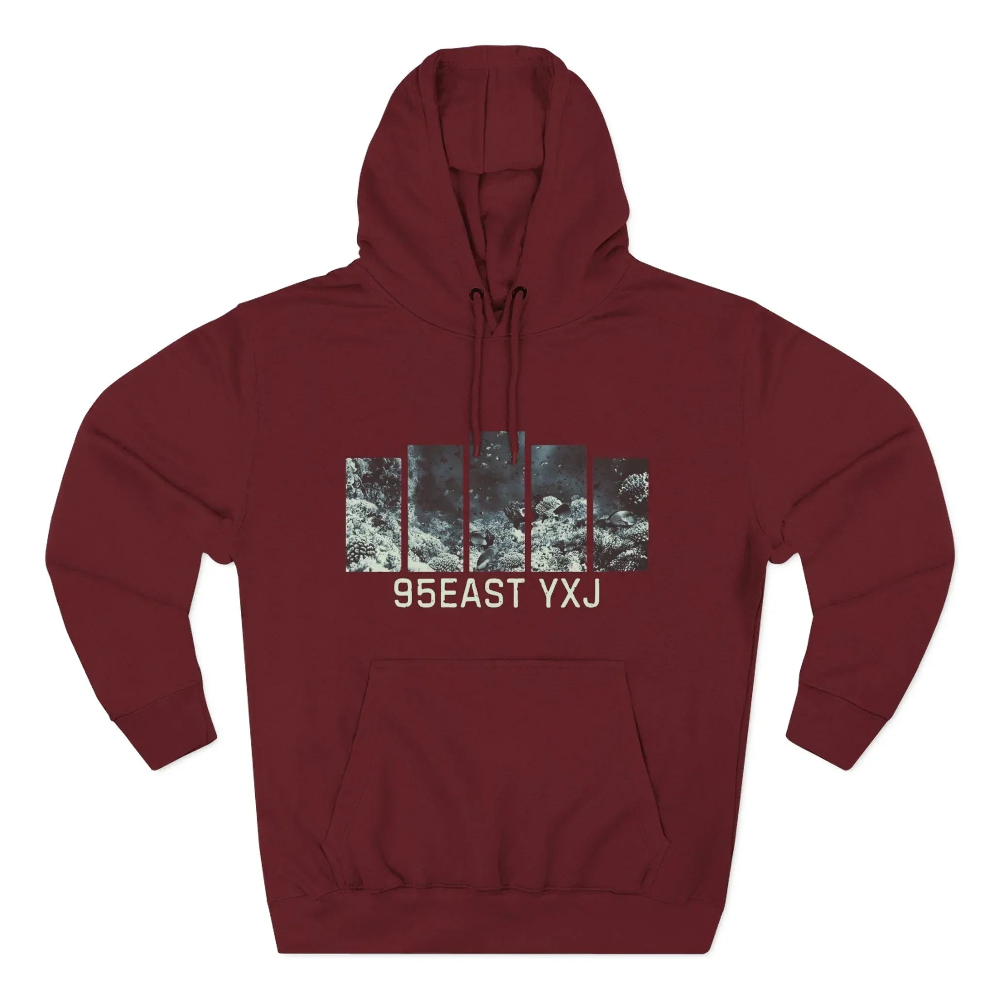 Maroon hoodie with abstract graphic panels and 95EAST YXJ text on the front
